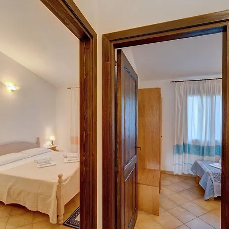 Апартаменты The Fantastic Residenza Badus Two Bedroom Sleeps Six And Child Num0821