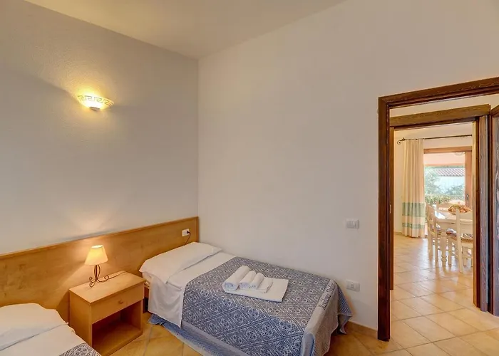 Апартаменты The Fantastic Residenza Badus Two Bedroom Sleeps Six And Child Num0821 Бадеси